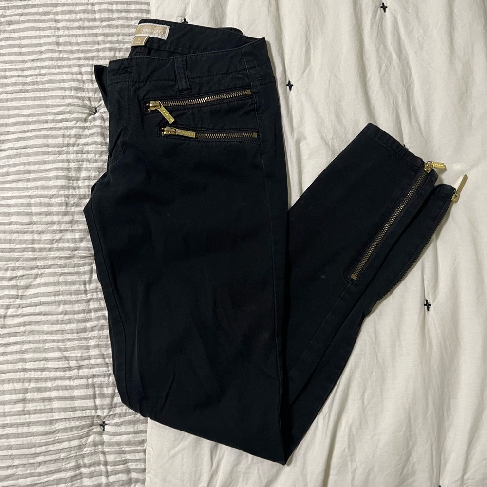 Michael Kors black with gold zipper jeans size 2